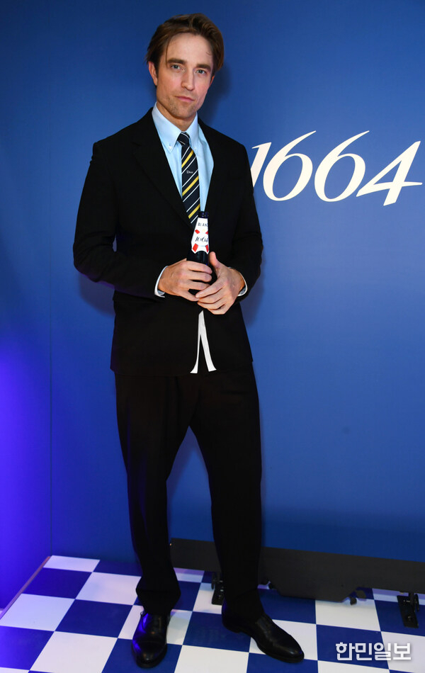 Robert Pattinson at the launch of 1664’s “Unquestionably Good Taste” campaign